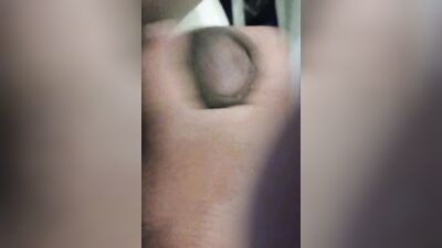 In the bathroom masturbating