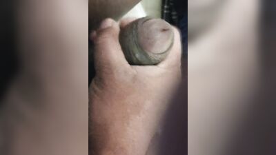 In the bathroom masturbating
