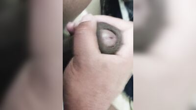 In the bathroom masturbating