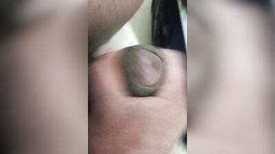 In the bathroom masturbating