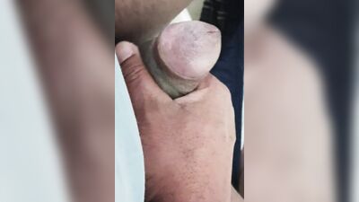 In the bathroom masturbating