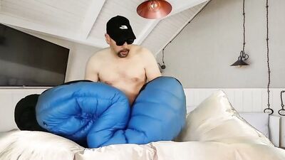 Humping Haglofs Down Bag on Silk Down Comforter.