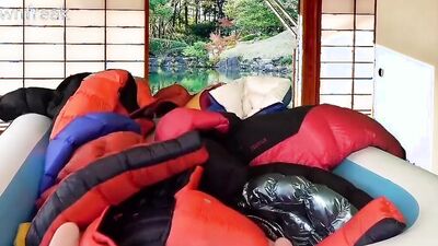 Humping 20 Down Puffer Jackets in an Inflatable Pool