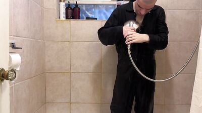 Dec 11 2022 - Dark blue coveralls omorashi pee and shower