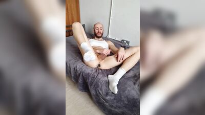 Man jerks off his dick and fucks himself in the ass