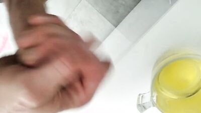 Horny Pig Pisses in a Cup and then Jerks off and Cums in the Piss