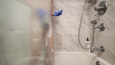 Hair Removal in Blue Latex Gloves