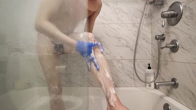 Hair Removal in Blue Latex Gloves
