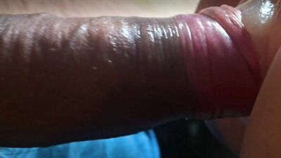 Detailed extreme closeup stiff glistening cock, foreskin pulled back, fucking, thrusting, penetrating rubber (TPE) pussy sex toy