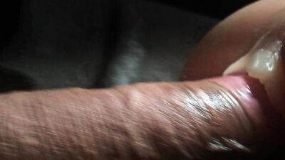 Detailed extreme closeup stiff glistening cock, foreskin pulled back, fucking, thrusting, penetrating rubber (TPE) pussy sex toy