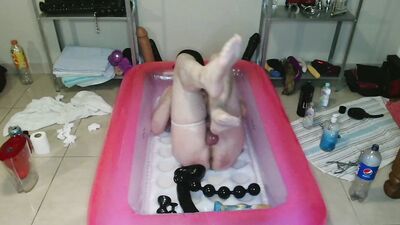 Pissing And Oil Anal Toy Fun In Pink Pool
