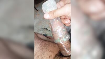 a delicious handjob with a condom, and using slime for greater pleasure.