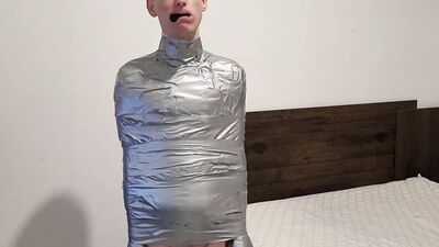 turning the boy into a mummy
