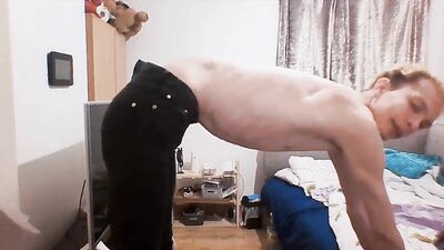Skinny Blonde hair twig shows off his body in his jeans and tests out his flexibility