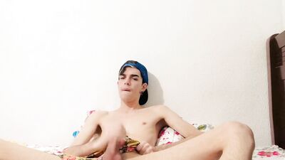 Hung Henry Evans tugs his long cock and prepares to cum