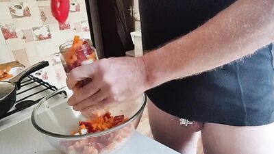 Guy with locked cock is in the kitchen