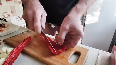 Guy with locked cock is in the kitchen
