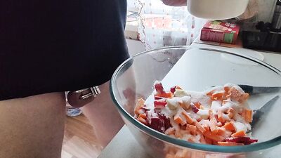 Guy with locked cock is in the kitchen