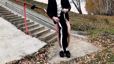 guy jerks off his dick under a traffic junction