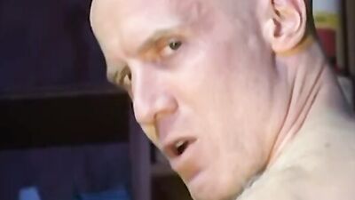 Bald hunk Hook Scott anal rides dildo while solo masturbation