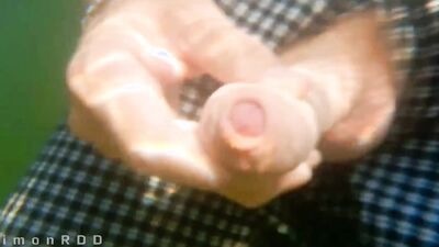 Guy on a boat in the wild masturbates dick and cums powerfully