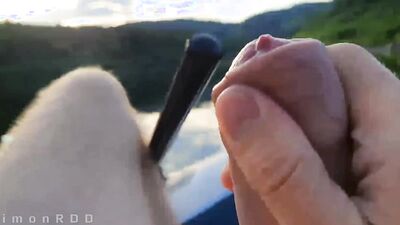 Guy on a boat in the wild masturbates dick and cums powerfully