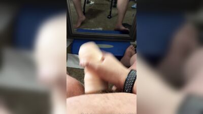 Big boy shoots a load using his fleshlight in front of a mirror