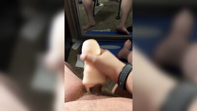 Big boy shoots a load using his fleshlight in front of a mirror
