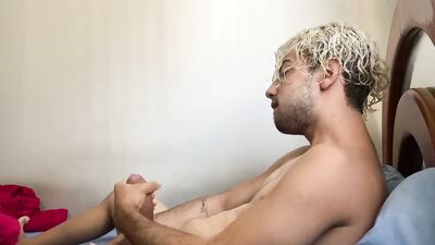 Blond jock Henry Lynes masturbates his thick fat cock solo