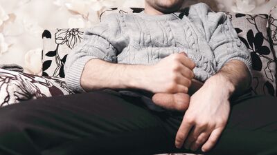 The guy watches porn and masturbates. Ruined orgasm 4 times and loud moans during a cumshot. 4K