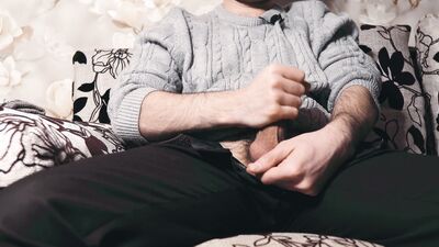 The guy watches porn and masturbates. Ruined orgasm 4 times and loud moans during a cumshot. 4K