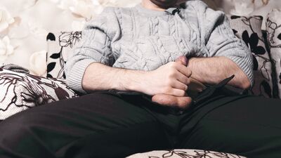 The guy watches porn and masturbates. Ruined orgasm 4 times and loud moans during a cumshot. 4K