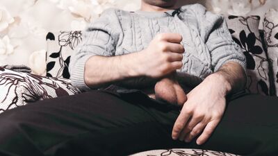 The guy watches porn and masturbates. Ruined orgasm 4 times and loud moans during a cumshot. 4K
