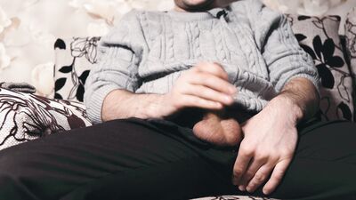 The guy watches porn and masturbates. Ruined orgasm 4 times and loud moans during a cumshot. 4K