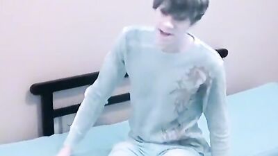 Dashing young man with killer abs tugs on his big hard cock