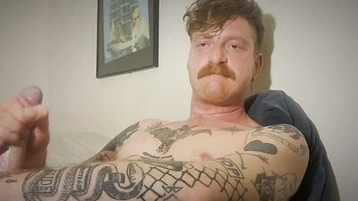 Hot tattoed redhead daddy jerks off and uses fleshligt