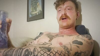 Hot tattoed redhead daddy jerks off and uses fleshligt