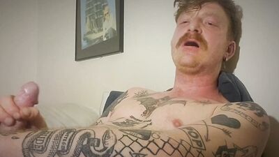 Hot tattoed redhead daddy jerks off and uses fleshligt