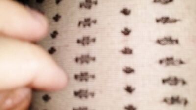 32V Black Dot Patterned Pantyhose and Red Toe Nails