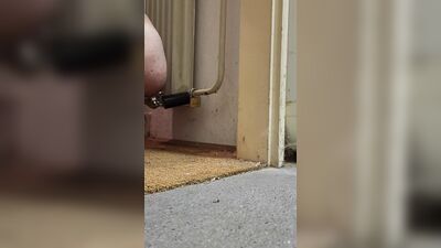 Anal chastity buttplug chained to the radiator with ice lock