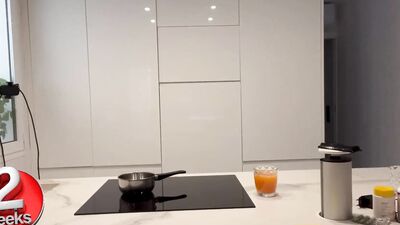 Washing dishes by hand in the kitchen