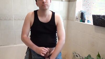 Boy Masturbating in the Bathroom