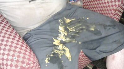 Having some hot cheese dip using nike shorts for bowl