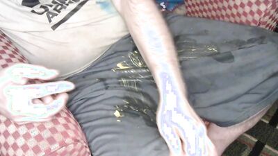 Having some hot cheese dip using nike shorts for bowl