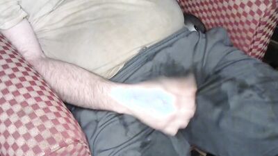 Having some hot cheese dip using nike shorts for bowl