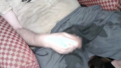 Having some hot cheese dip using nike shorts for bowl