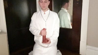 Cute altar boy worships dildo