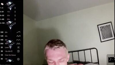 male camming model seducing viewer in his blue bedazzled superhero bodysuit (lol no homo)