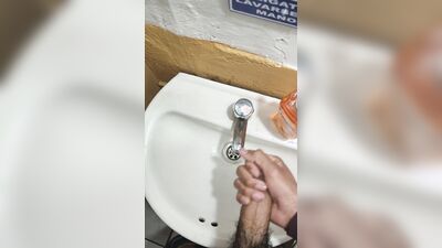 YOUNG GUY WITH GOOD COCK MASTURBATES IN A RESTAURANT BATHROOM