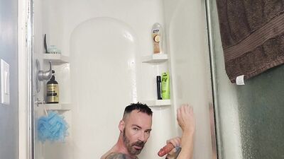 Mikel Donovon fucks and sucks his dildo in the shower!